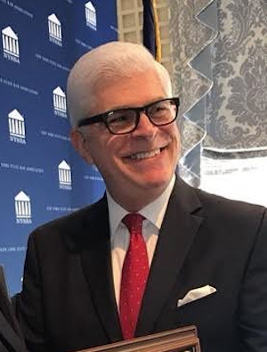 The NYSBA (pictured is President Michael Miller) is urging Congress to pass a bill that would allow people to petition the court to seal or expunge their criminal records. Photo courtesy of the NYSBA