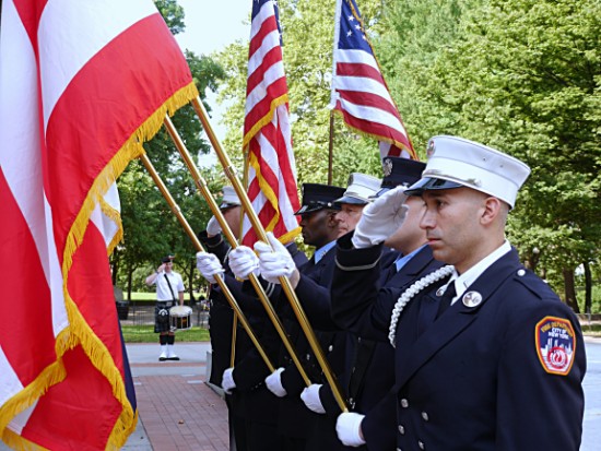 The FDNY ceremonial unit color guard salutes the flag. Eagle photo by Arthur de Gaeta