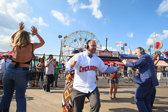 NYC Speaker Corey Johnson and Councilmember Mark Treyger put on moves during silent disco in front of Deno’s Wonder Wheel. Eagle photos by Andy Katz