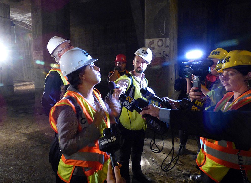 Tanvi Pandya, project manager with the city’s Department of Transportation, points out the disintegrating interior of the BQE. Holes in the underside of the roadbed were visible from inside.
