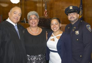 The Cervantes Society hosted its 24th annual Hispanic Heritage Month celebration in Brooklyn’s Surrogate’s Court on Friday. Pictured from left: Hon. Francois Rivera, chef Suzette Montalvo, Hon. Joanne Quinones and court officer Edwin Colon. Eagle photos by Rob Abruzzese