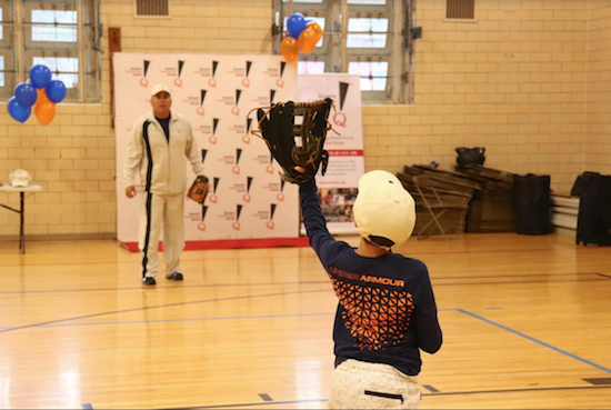The former NY Mets second baseman played catch with a student during his visit to the after-school program. Photos courtesy of Queens Community House