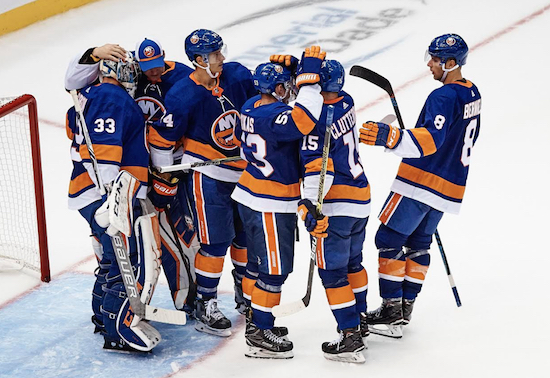 The Islanders celebrated a 3-0 victory at Nassau Coliseum on Sunday in their first preseason game under new head coach Barry Trotz. AP Photo by Andres Kudacki