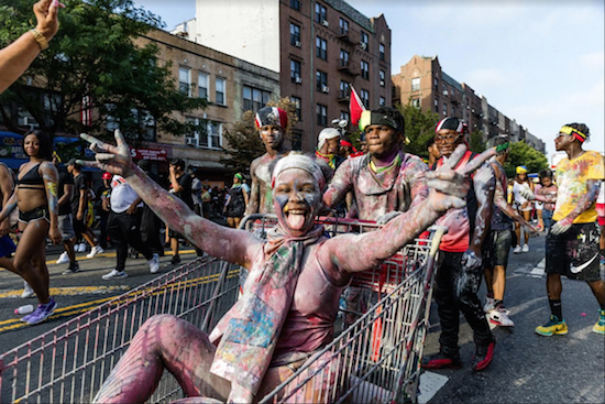 Many attendees covered themselves in paint as they danced down the streets. Eagle photos by Paul Frangipane