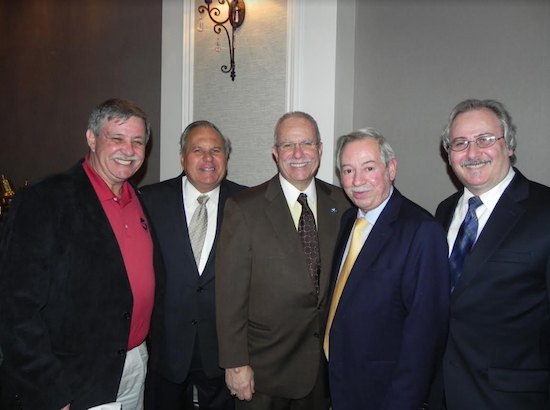 William Guarinello (center) says of community board term limits, “I don’t think it has hurt the community to have continuity.” He is pictured at a Bay Ridge event a few years ago with (left to right) HeartShare Human Services Vice President Joseph Guarinello, Community Board 10 member Dean Rasinya, Assemblymember Peter Abbate and Brooklyn Chamber of Commerce Acting President Richard Russo. Eagle file photo by Paula Katinas
