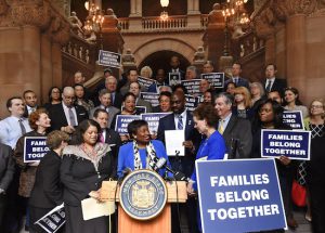 In this file photo, Senate Democratic Conference Leader Andrea Stewart-Cousins, D-Yonkers, stands behind the podium flanked by members of the New York Assembly Democratic Conference calling for an immediate end to the Trump White House policy of family separation for migrants crossing the US-Mexico border. New York Democrats are hoping a 'blue wave' during the upcoming election will help them take control of the state Senate, the last GOP bastion in Albany. AP Photo/Hans Pennink, File