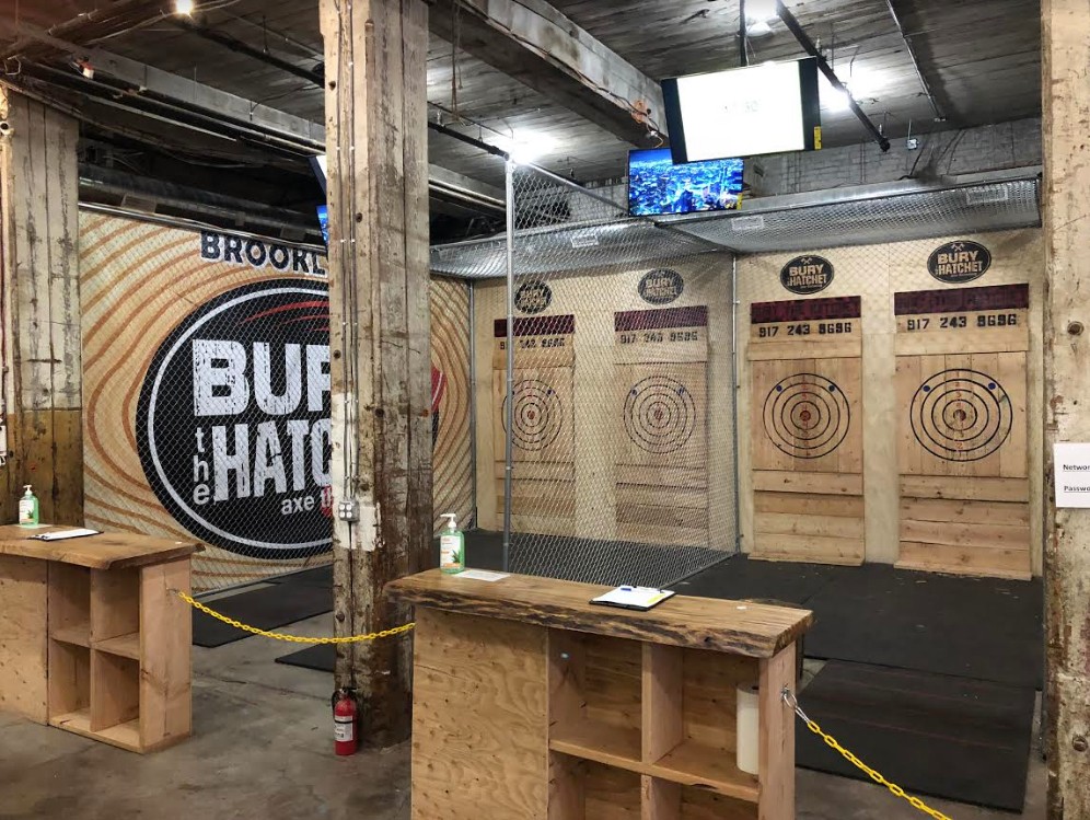 The 5,000-square-foot space features eight ax-throwing lanes.