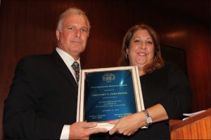 The Brooklyn Bar Association recognized four honorees during its annual awards ceremony on Wednesday. Pictured is Gregory Cerchione, who received the Distinguished Service Award from immediate past President Aimee Richter. Eagle photos by Mario Belluomo