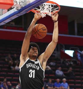 Brooklyn Nets center Jarrett Allen dunks during the first half of an NBA preseason basketball game against the Detroit Pistons on Monday in Detroit. AP Photo/Carlos Osorio
