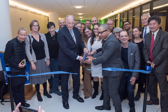 Faculty, staff, students and friends of New York City College of Technology’s Department of Communication Design cut the ribbon on the department’s renovated home inside the college’s Pearl Building at 259 Adams St. Photo courtesy of New York City College of Technology's Department of Communication