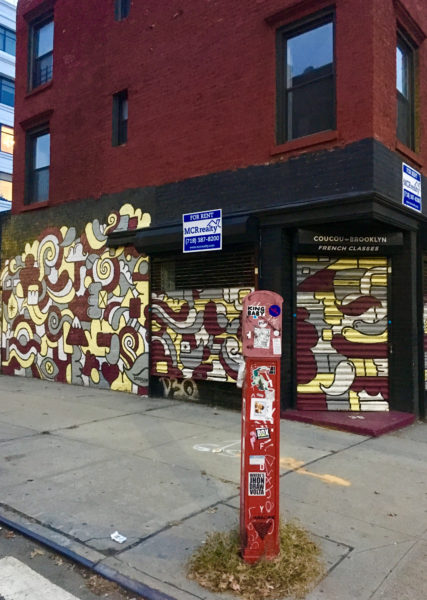 A mural by D. Addison decorates the facade of 38 Marcy Ave.