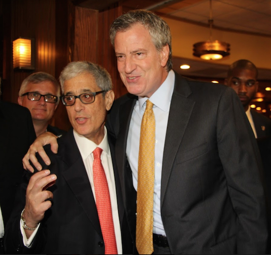 Steve Cohn (left), with Mayor Bill de Blasio, hosted his annual Cheesecake Breakfast at Junior’s on Friday where he encouraged people to spread love. After all, it is the Brooklyn way. Eagle photo by Mario Belluomo
