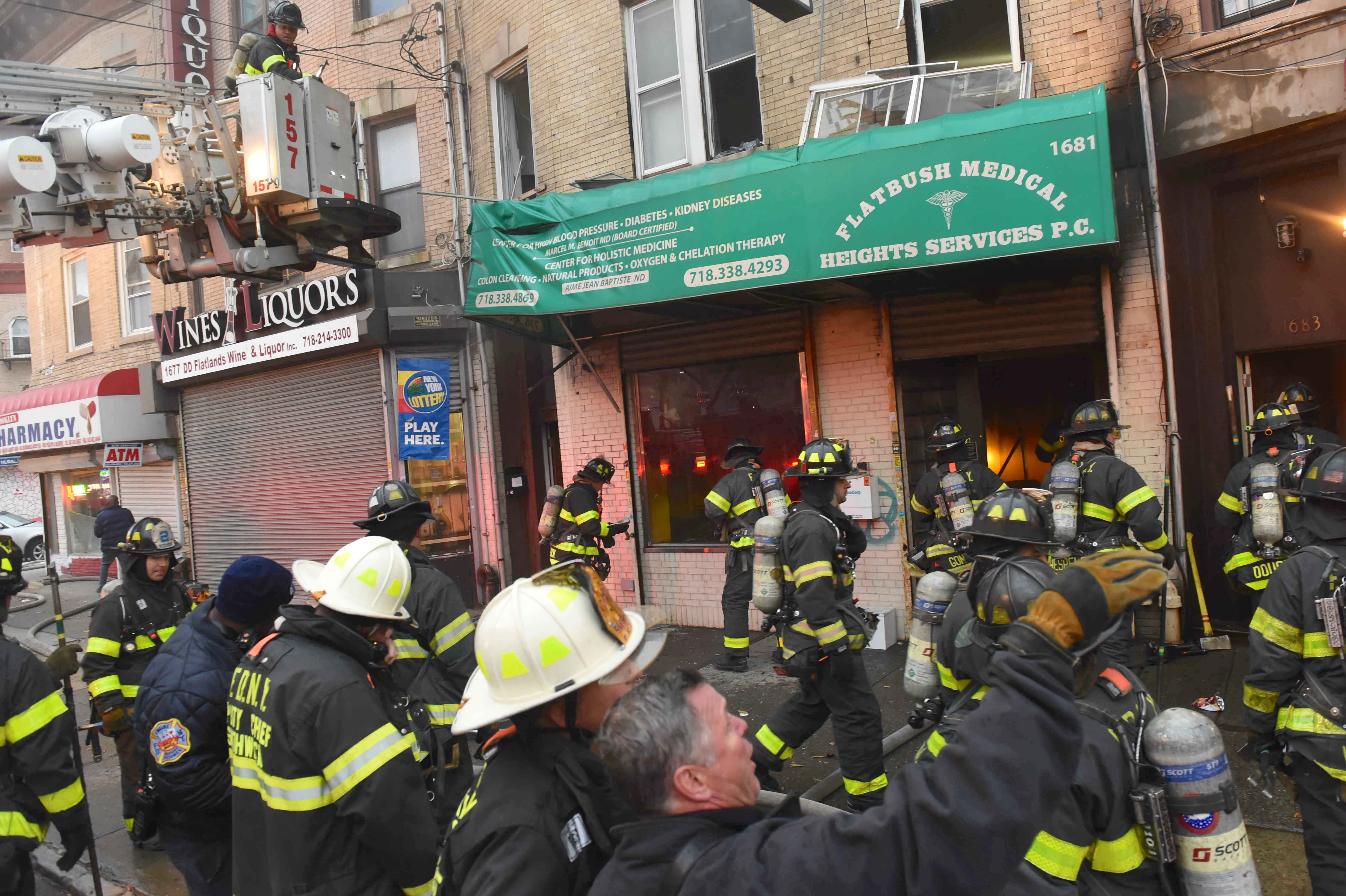 Firefighters battle two-alarm fire in a medical clinic on Flatbush Avenue. Eagle photos by Todd Maisel