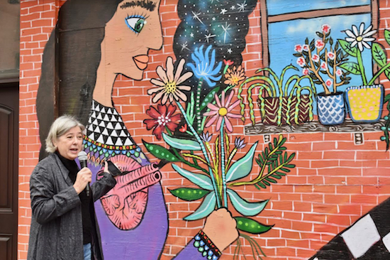 Heidi Cunnick, a leader of the Court-Smith BID effort, at a celebration of the mural's completion Photo by Steve Koepp