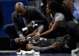 Caris LeVert lies in anguish on the court in Minnesota Monday night following what many believed would be a season-ending leg injury. But the Nets announced Tuesday afternoon that LeVert could be back by the end of the season with a broken foot. AP Photo by Hannah Foslien