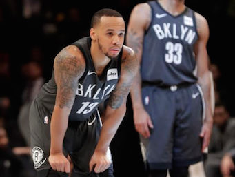 Shabazz Napier and Allen Crabbe (background) look on in dismay during the Nets’ 120-107 loss to Miami at Downtown’s Barclays Center on Wednesday night. AP Photo by Frank Franklin II