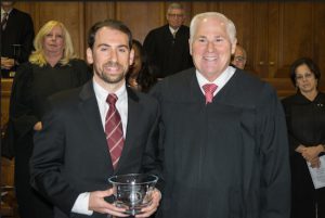 Hon. Alan D. Scheinkman (right), presiding justice of the Appellate Division, Second Judicial Department, presents Gregory N. Edwards with a Mollen Award at the eighth annual Milton Mollen Commitment to Excellence Awards ceremony. Eagle photos by Rob Abruzzese