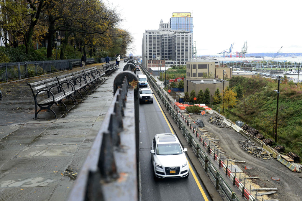 The BQE Panel appointed by Mayor Bill de Blasio is nearing the end of its study, and a wide range of options are being considered. Above, the northbound lane of the BQE can be seen below the Brooklyn Heights Promenade walkway. Eagle photo by Todd Maisel