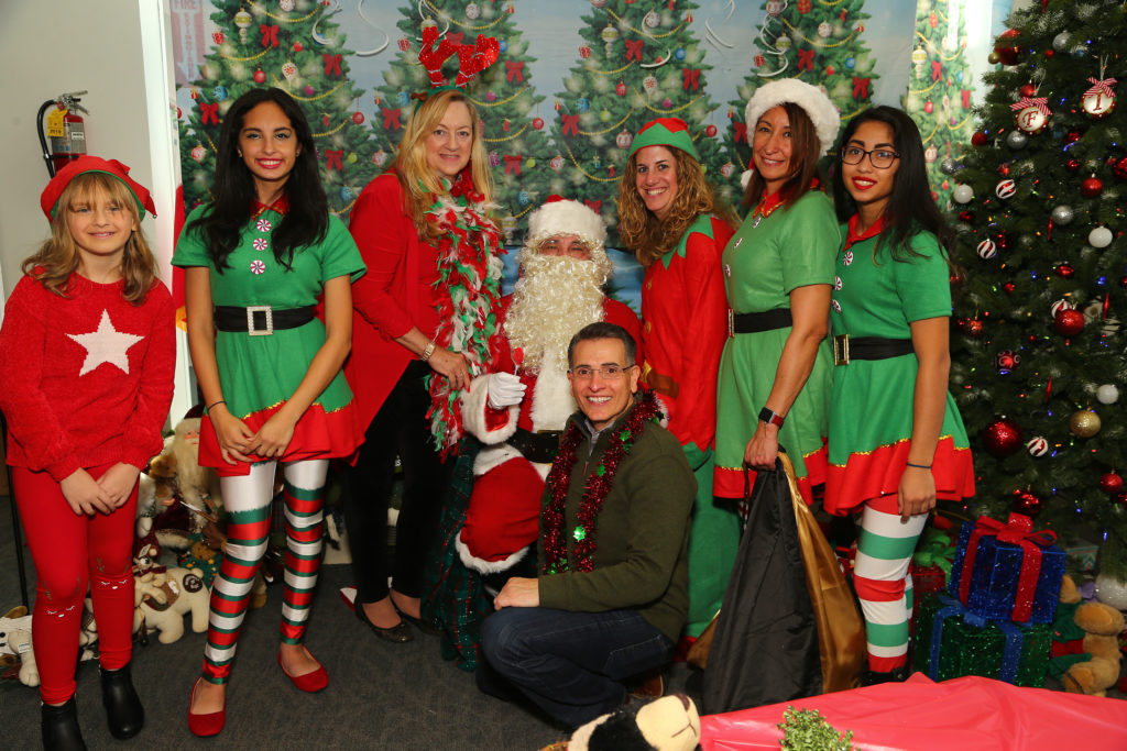The Bay Ridge Lawyers Association held its second annual “Breakfast with Santa” on Saturday. Kids did arts and crafts and met with Santa. Pictured are Santa and his elves with past Presidents Margaret Stanton (left of Santa) and Joann Monaco (right of Santa) and current president Joseph Vasile (sitting center). Eagle photos by Andy Katz