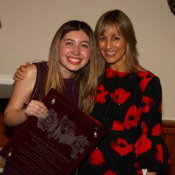 ADA Lauren Mack (right) presented Olivia Mittman (left), the niece of Sue-Ellen Bienenfeld, with a plaque from the NYPD in honor of her late aunt.