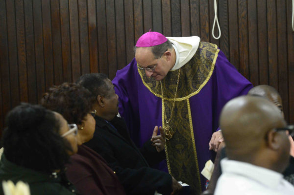 Bishop Lawrence Provenzano speaks with members of the Emmanuel congregation. 