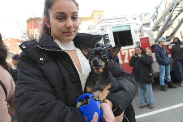Victoria Guiteriez holds her dog Luna after the two escaped from their home. 