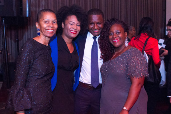 Two out of seven scholarship winners (from left), Kennesha Allums and Ibrahim Diallo; Hon. Verna Saunders, chairwoman of the scholarship committee; and Hon. Ruth Shillingford (left).