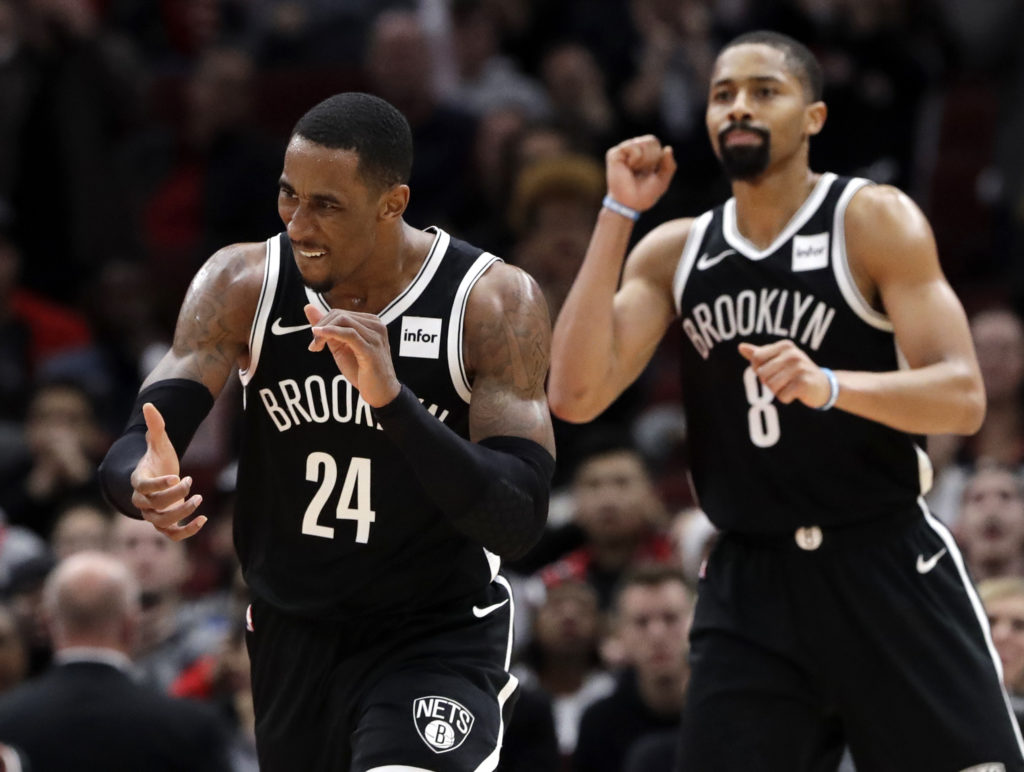 Rondae Hollis-Jefferson and Spencer Dinwiddie celebrate the Nets’ season-high seven-game winning streak in the waning moments of Brooklyn’s 96-93 win in Chicago on Wednesday night. AP Photo by Nam Y. Huh