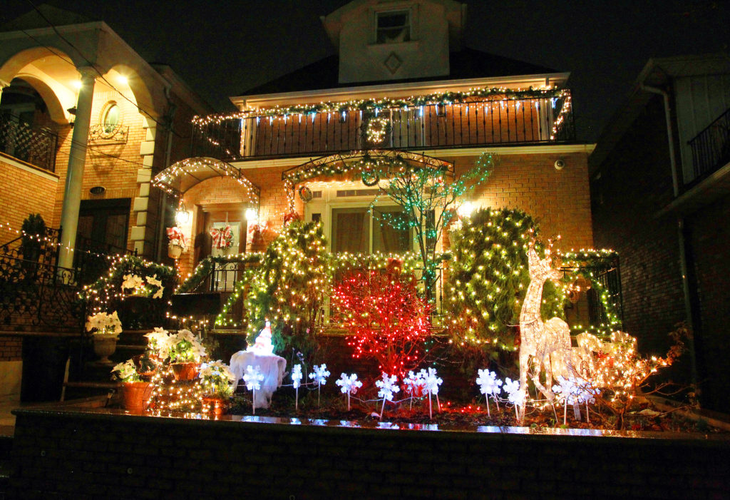 The beautiful displays of Christmas lights in Dyker Heights are a popular event, but some in the neighborhood are worried the community-wide show has grown too large. Eagle photo by Steve Solomonson