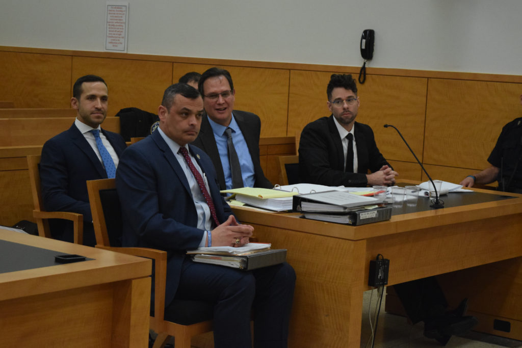 David Keegan Riotto Haigh (right) with his defense attorneys Thomas H. Andrykovitz (middle left) and Jeffrey E. Goldman (middle), as well as Private Investigator Daniel Costa (front left) on Wednesday, Nov. 5. Eagle photo by Christina Carrega