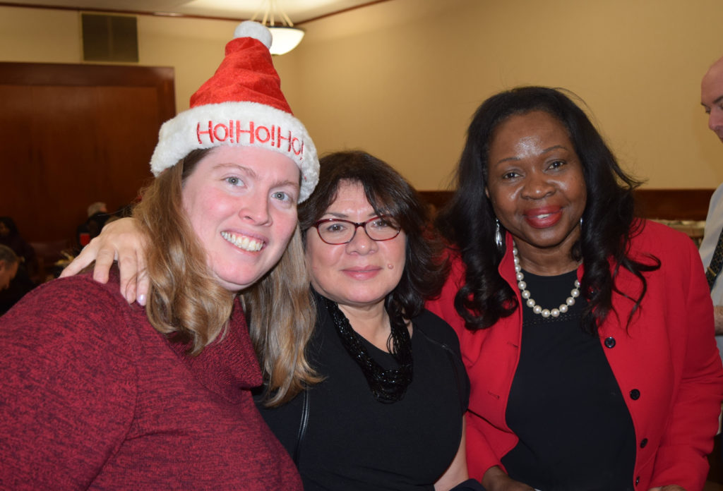 The Kings County Supreme Court held its annual holiday party for court employees on Wednesday. Pictured from left: Kim Smalley, Grace Machuca and Hon. Sylvia Hinds-Radix. Eagle photo by Rob Abruzzese