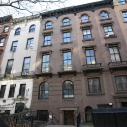 In this Dec. 10, 2018 photo, a brownstone apartment building, center, owned by Kushner Companies is shown in Brooklyn Heights. AP Photo/Mark Lennihan