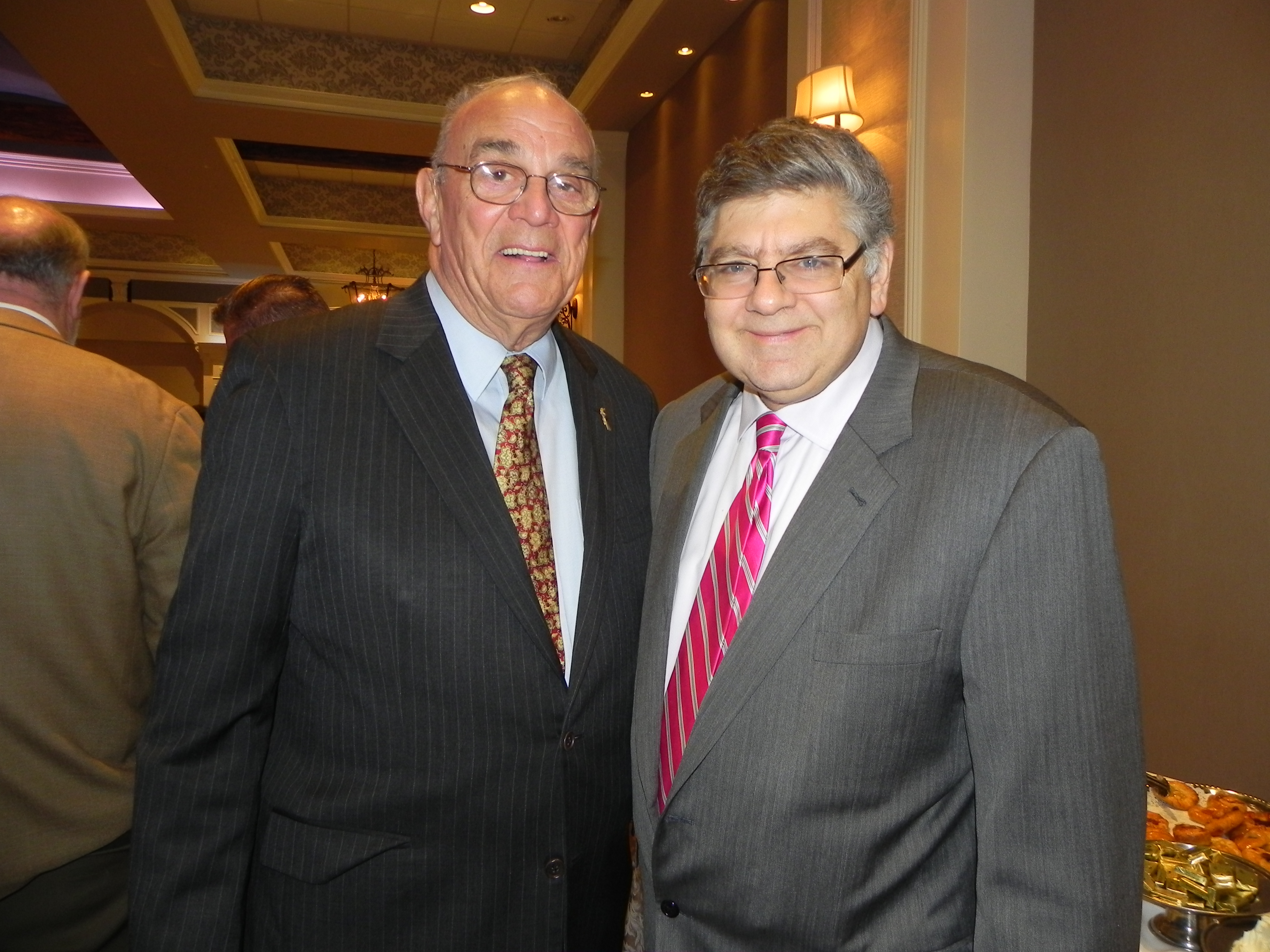 New York State Conservative Party Chairperson Mile Long (left), pictured with former Brooklyn Conservative Party head Jerry Kassar at a Bay Ridge event, says the pay raise for legislators is unfair to taxpayers. Eagle file photo by Paula Katinas