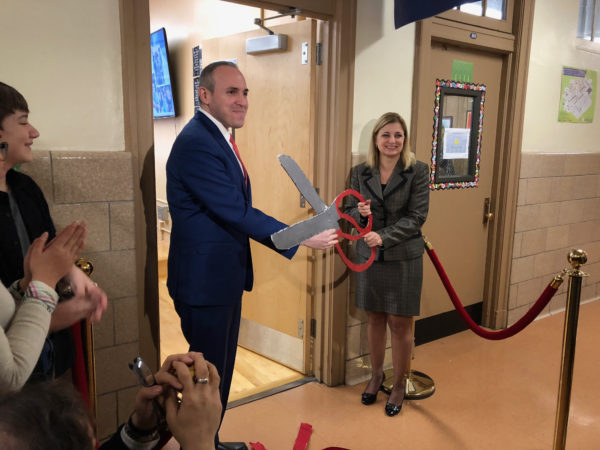 Councilmember Mark Treyger and Principal Karen Ditolla cut the ribbon to the new courtroom.