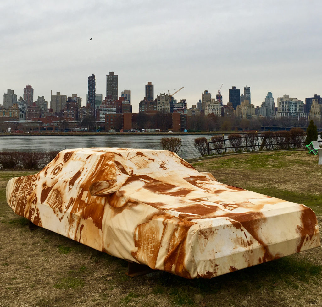 Welcome to Socrates Sculpture Park on Long Island City's waterfront. “Into the ground,” the eye-catching sculpture in the foreground, is by artists Joe Riley and Audrey Snyder. Eagle photos by Lore Croghan