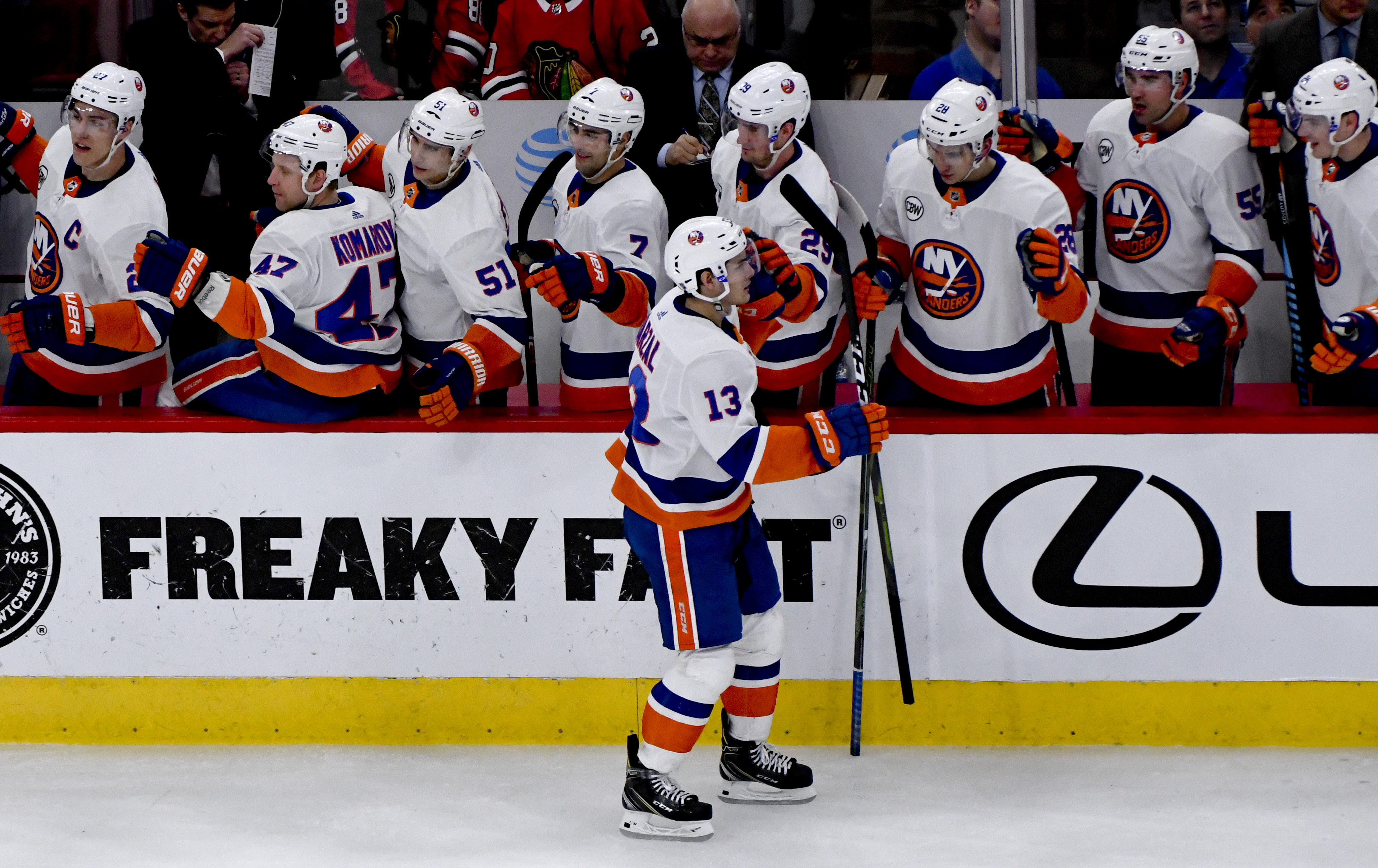 Mathew Barzal receives congratulations from the Islanders’ bench after scoring his 14th goal of the year during New York’s 3-2 shootout loss to the Blackhawks in Chicago on Tuesday night. AP Photo/Matt Marton