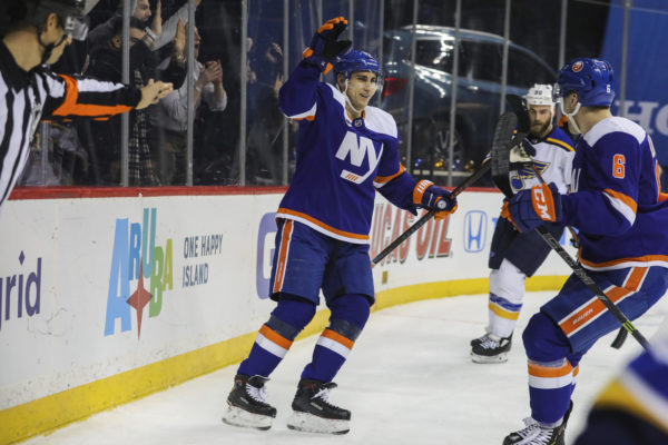 Veteran forward Valtteri Filppula receives congratulations from teammates after lighting the lamp in overtime to give the Islanders a 2-1 win over St. Louis at Downtown’s Barclays Center on Tuesday night.