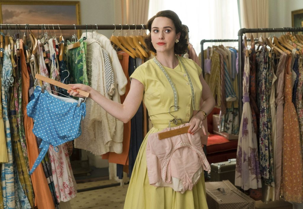This image released by Amazon shows Rachel Brosnahan in a scene from "The Marvelous Mrs. Maisel." The meticulous costumes of the 1950s-era show are crafted by designer Donna Zakowska. (Nicole Rivelli/Amazon via AP)