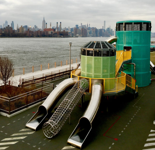  Domino Park's got groovy playground equipment. You can see the Empire State Building in the distance.