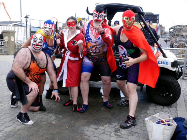 A group of wrestling fans is all decked out for the plunge.