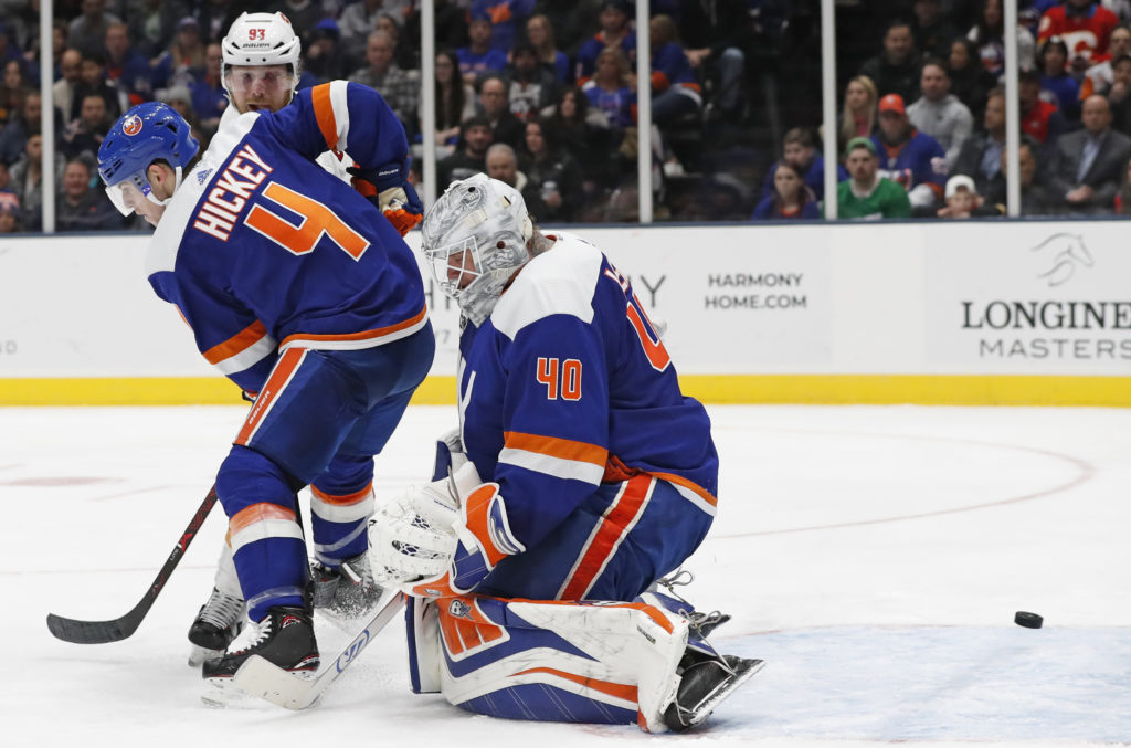 Robin Lehner made 24 saves, but this shot by Mikael Backlund slipped through his pads and gave Calgary the lead for good during the third period of the Islanders’ 3-1 loss to the Flames at NYCB Live Tuesday night.(AP Photo/Kathy Willens)