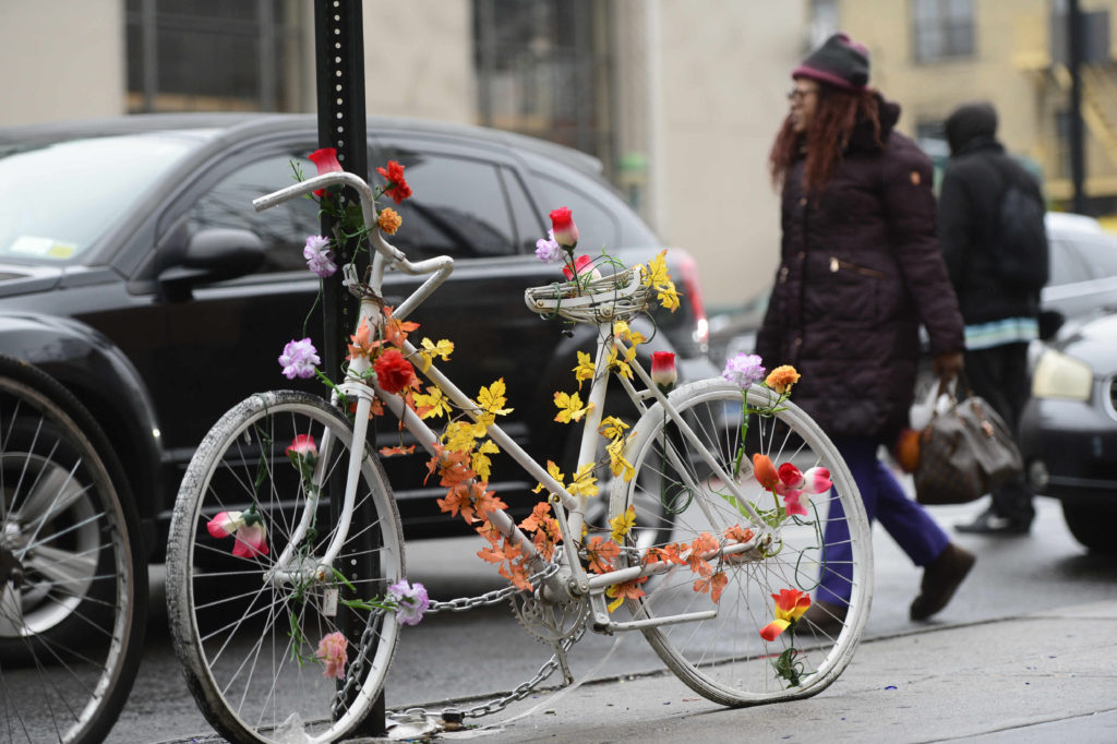 People have installed "ghost bikes" around the city in memory of killed cyclists. This one is at Church Avenue and Nostrand Avenue in Flatbush. Eagle file photo by Todd Maisel
