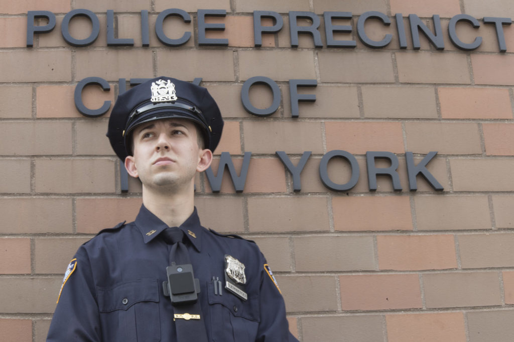 AN NYPD OFFICER WEARS A BODY CAMERA. AP PHOTO/MARY ALTAFFER.