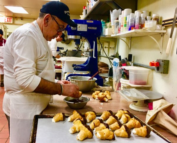 Pasticceria Monteleone’s owner Antonio Fiorentino is busy in the kitchen. Eagle photo by Lore Croghan