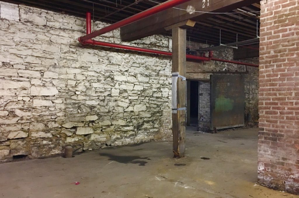 There are old stone walls in part of 204 Van Dyke St.’s basement. Eagle photo by Lore Croghan 
