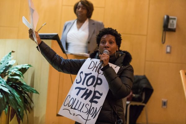 Harry Silver Co Inc. shareholder Leslie Jules protests alleged misappropriation of funds from the Harry Silver board and its president Unella Rhone-Perry. Eagle photo by Paul Frangipane