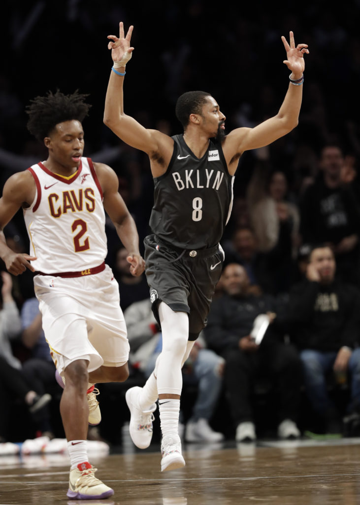 Cleveland Cavaliers forward Kevin Love (0) defends Brooklyn Nets guard Spencer Dinwiddie (8) during the first half of Wednesday night's game. AP Photo/Kathy Willens