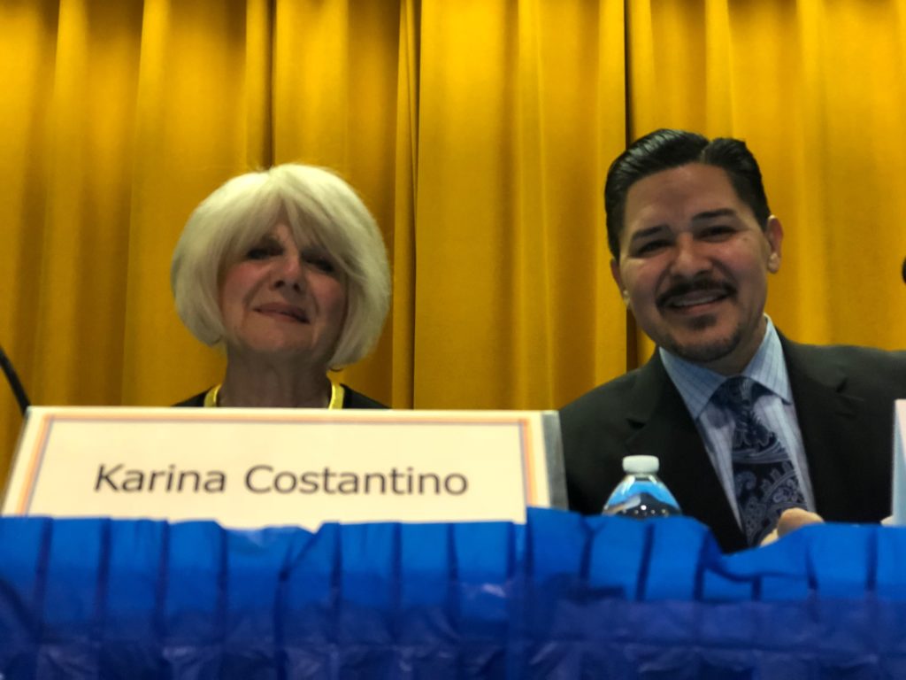District 20 Superintendent Karina Costantino and Schools Chancellor Richard Carranza were all smiles before the start of the town hall. But the evening grew tense when Carranza was asked about proposed changes to the city’s elite high schools. Eagle photo by Paula Katinas