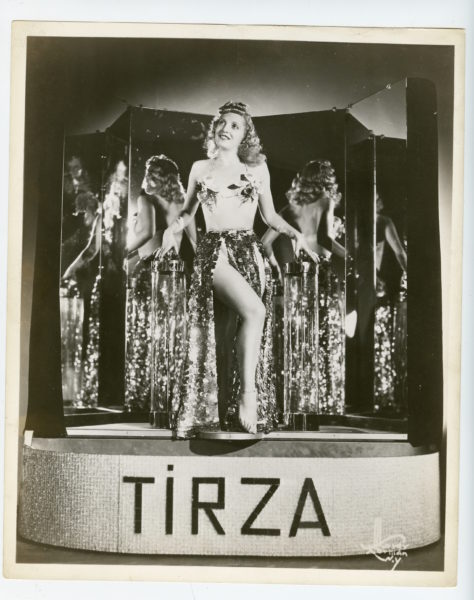 Madam Tirza was a reportedly queer burlesque dancer who worked on and off at Coney Island from 1940 to 1953. Madam Tirza publicity still, circa 1940. Image courtesy of the Collection of David Denholtz