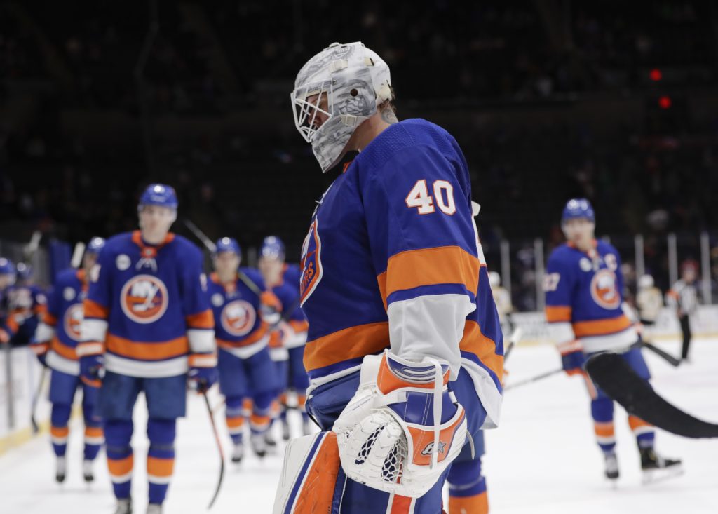 Robin Lehner and his dejected teammates were dominated from start to finish during Tuesday night’s 5-0 loss to Boston in front of a disappointed sellout crowd in Uniondale, N.Y. (AP Photo/Frank Franklin II)